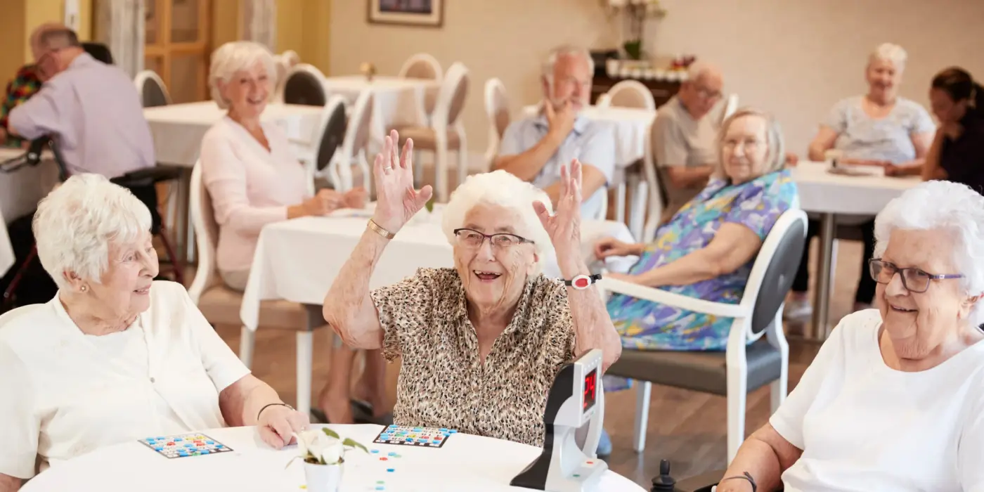 residents having fun playing bingo together