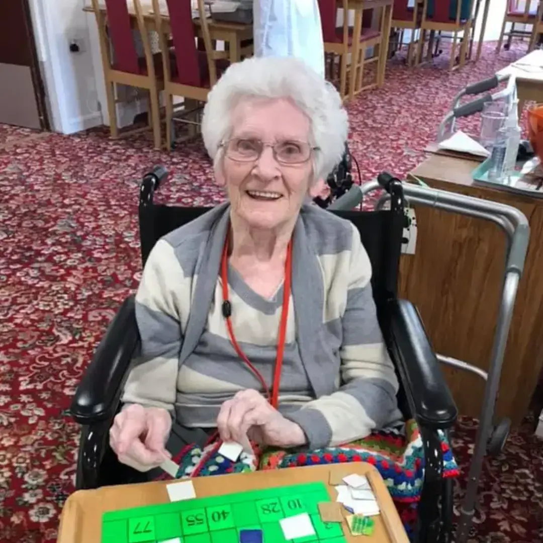 ELDERLY RESIDENT PLAYING GAMES