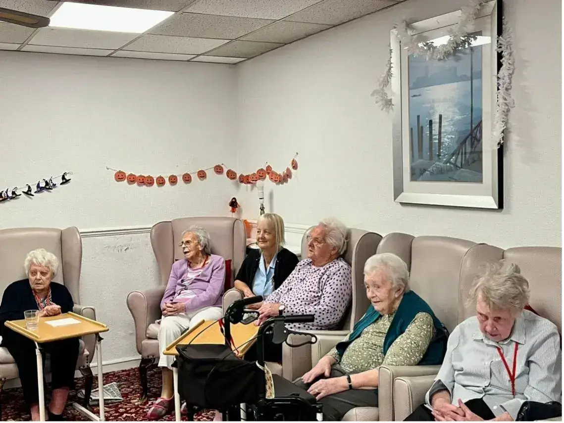 residents together in lounge area on chairs