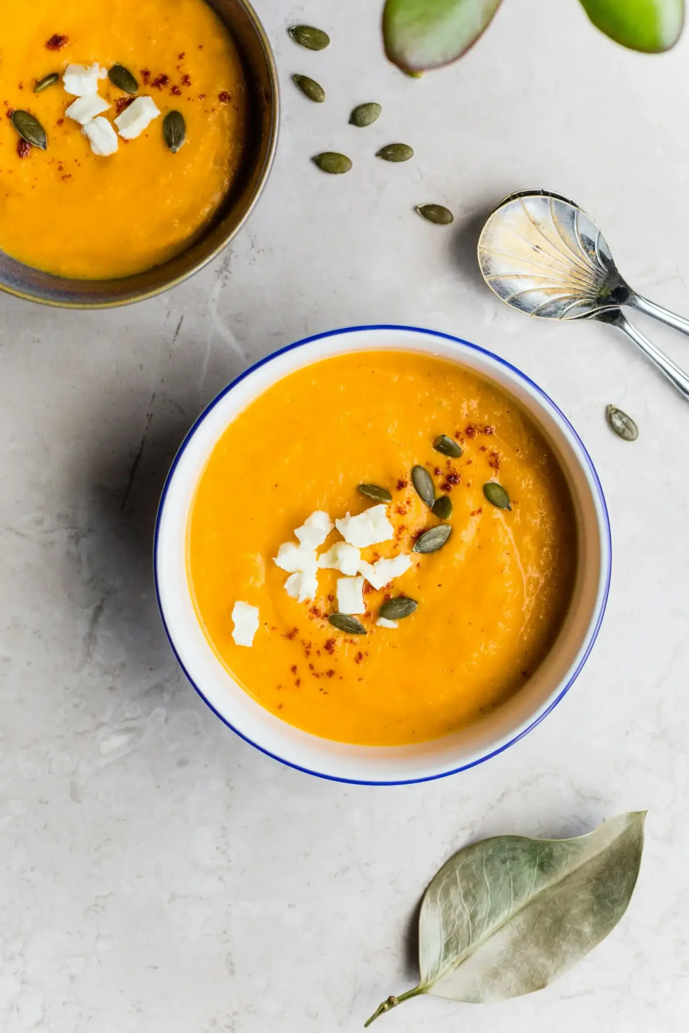 butternut squash soup on white table